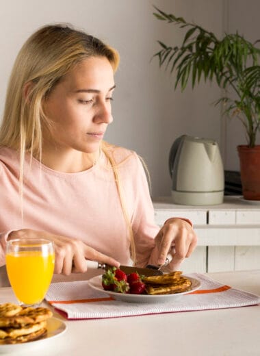 girl having waffles watching tablet Bin Recipes