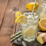 Metabolism boosting morning drink with lemon, ginger, and apple cider vinegar ingredients.