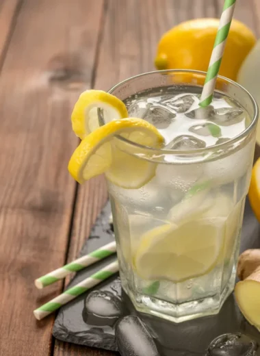 Metabolism boosting morning drink with lemon, ginger, and apple cider vinegar ingredients.