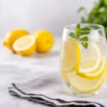 Ginger lemon fat-burning drink with fresh ingredients for detox and weight loss