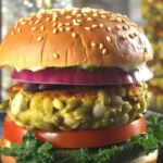 High protein moong sprouts burger topped with fresh veggies and homemade sauce.